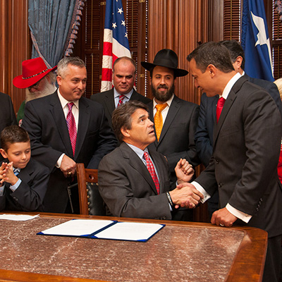 Texas Values President Jonathan Saenz thanks Gov. Perry for signing Merry Christmas Bill into law